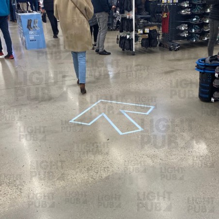 Luminous arrow for in-store customer flow Luminous arrow for in-store customer flow