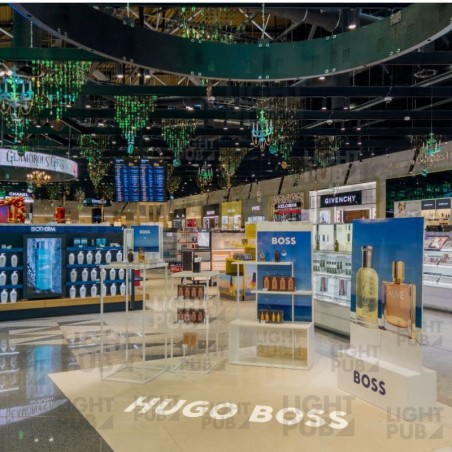 In-store merchandising luminous logo projection In-store merchandising luminous logo projection